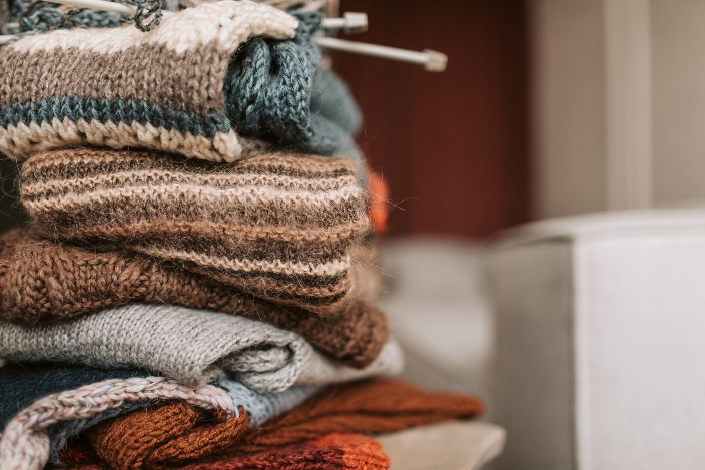 A stack of folded textured knitwear
