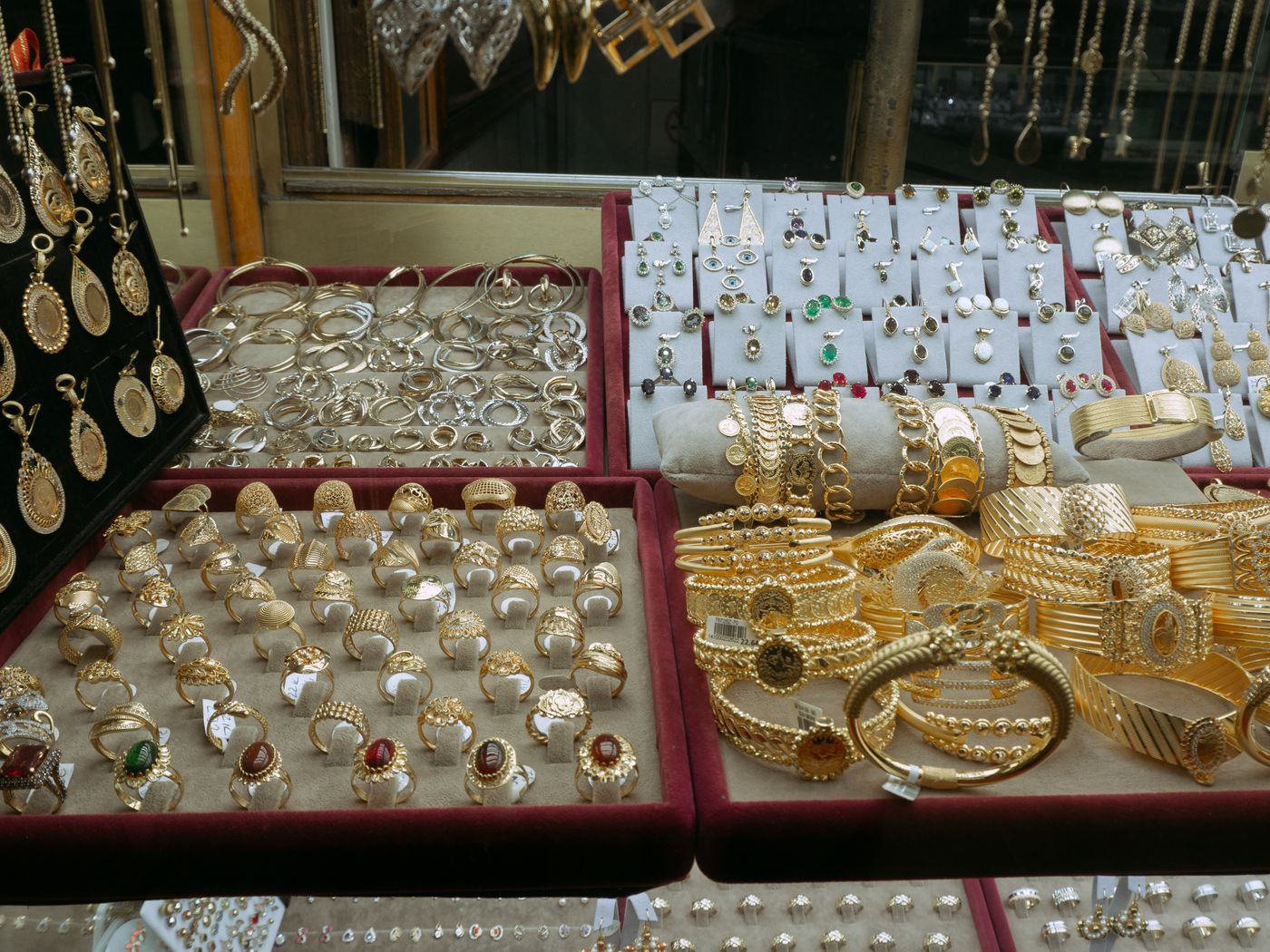 Gold-toned and silver-toned jewellery displayed together