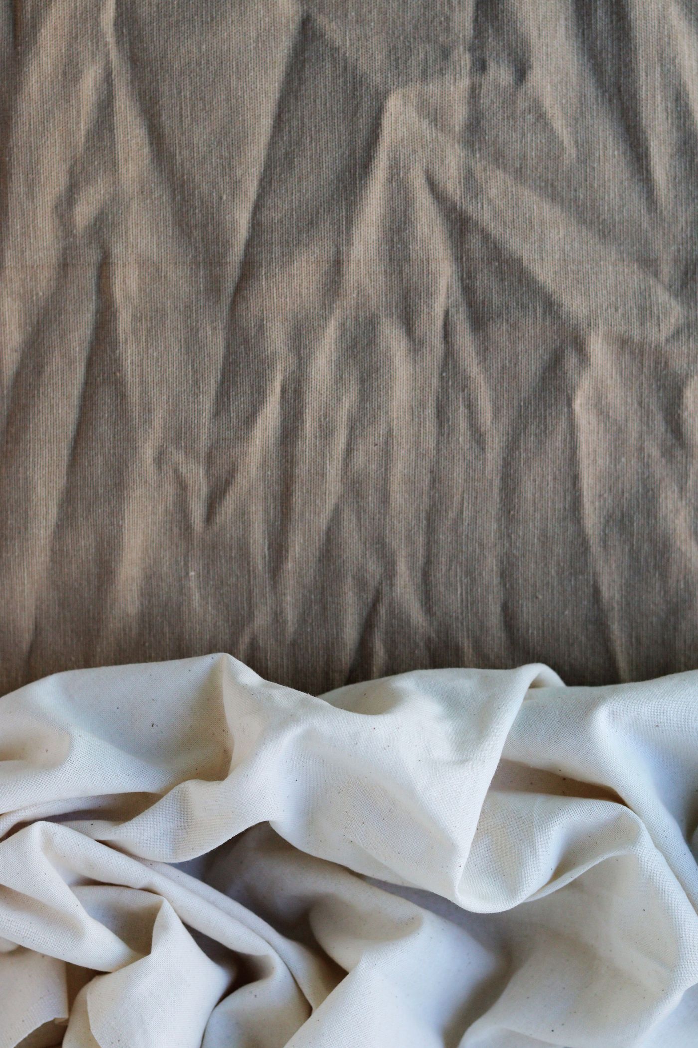 Two fabrics showing different weights and drapes