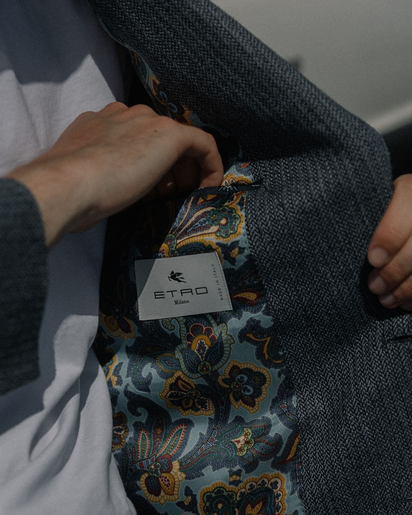A jacket opened to show its patterned lining
